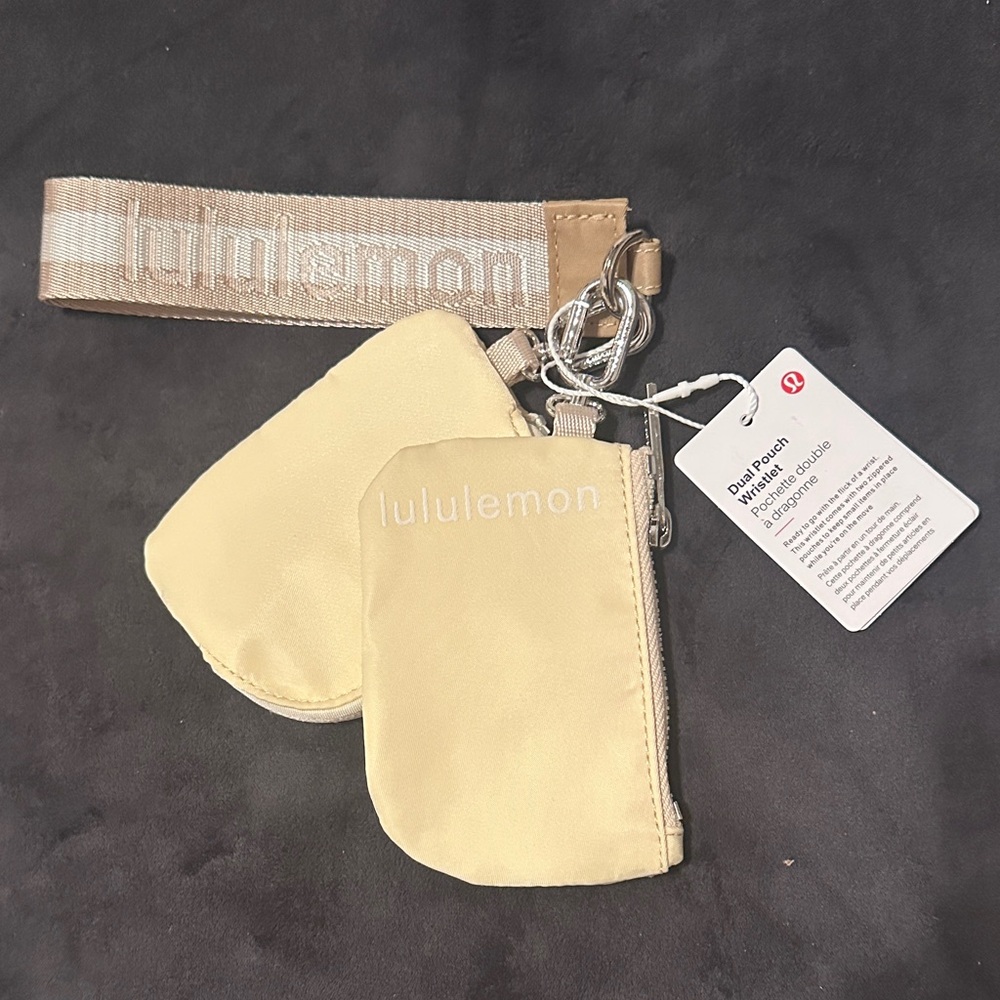 Lululemon Dual Pouch Wristlet in the color off white